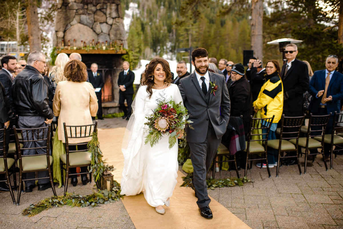 Lake Tahoe Wedding Planners couples wedding ceremony at outdoor fireplace in snow at venue The Resort at Squaw Creek, Lake Tahoe, Joy of Life Events image by Charleston Churchill 2